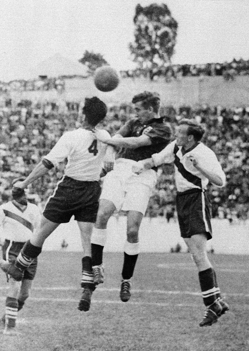 English midfielder Thomas Finney in action against USA defenders Charlie Colombo and Walter Bahr during their 1950 World Cup clash. File photograph: Getty Images