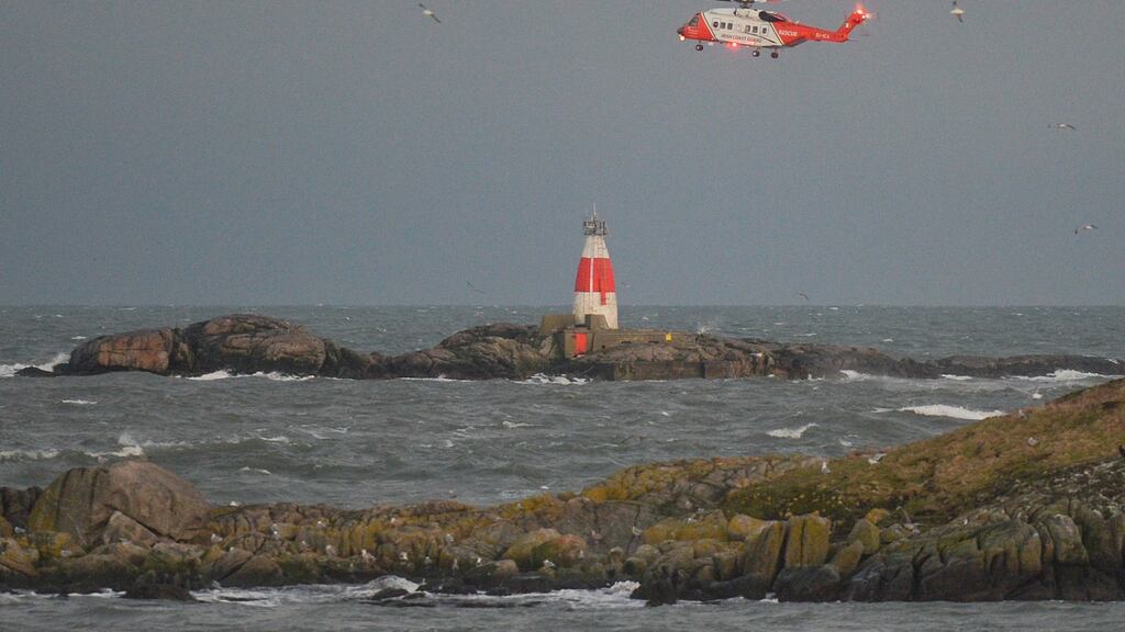 Irish Cost Guard rescue helicopter patrolling the sea off Dalkey Island, during Covid-19 level 5 lockdown. Photograph: PhoArtur Widak/NurPhoto via Getty
