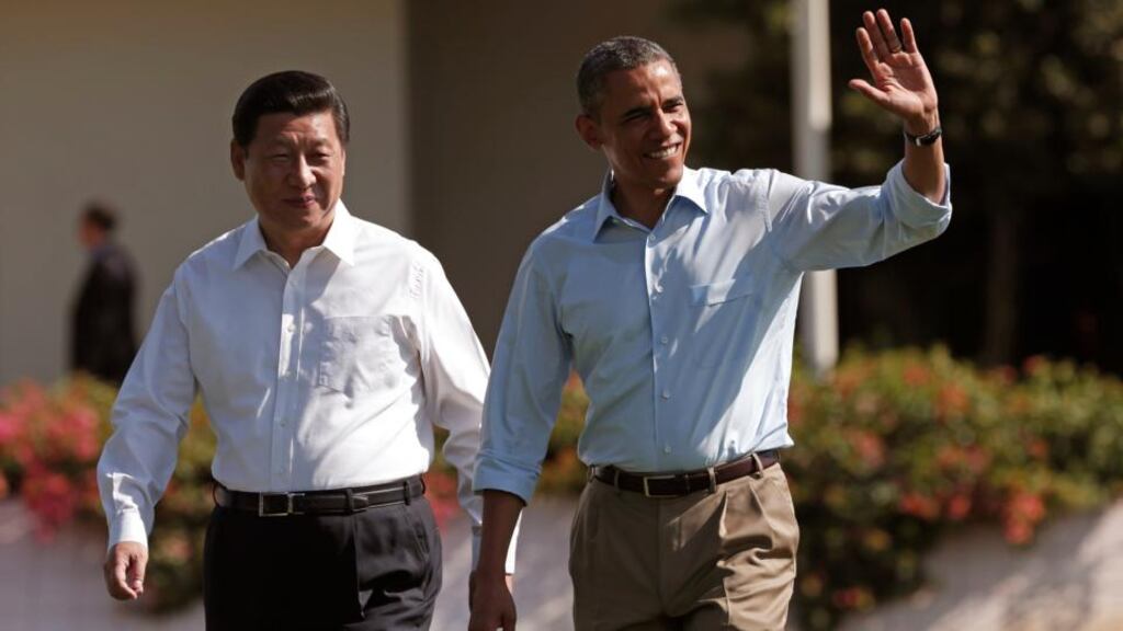 US president Barack Obama and Chinese president Xi Jinping walk the grounds at the Annenberg Retreat at Sunnylands in Rancho Mirage in California on Saturday. Photograph: Reuters/Kevin Lamarque