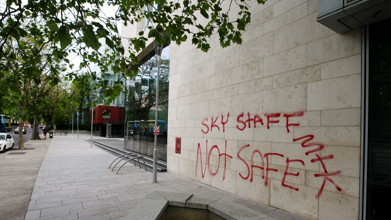 The graffiti outside Burlington Plaza also threatened SKY staff. Photograph: Padraig O’Reilly