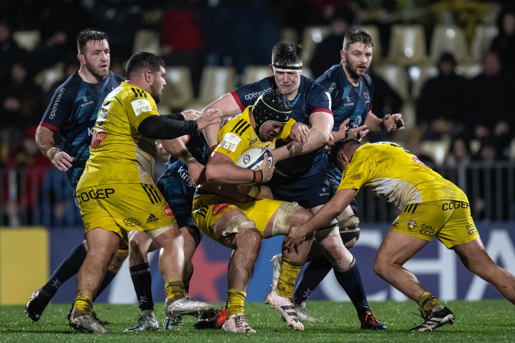 La Rochelle's French number 8 Gregory Alldritt (c) is tackled by Ulster. Photograph: Xavier Leoty/AFP via Getty