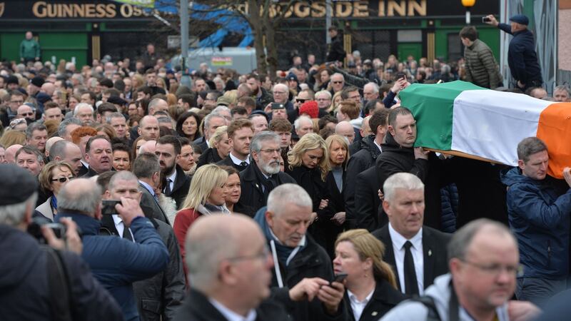 The coffin of the late Martin McGuinness is carried through the streets of Derry. Photograph: Alan Betson