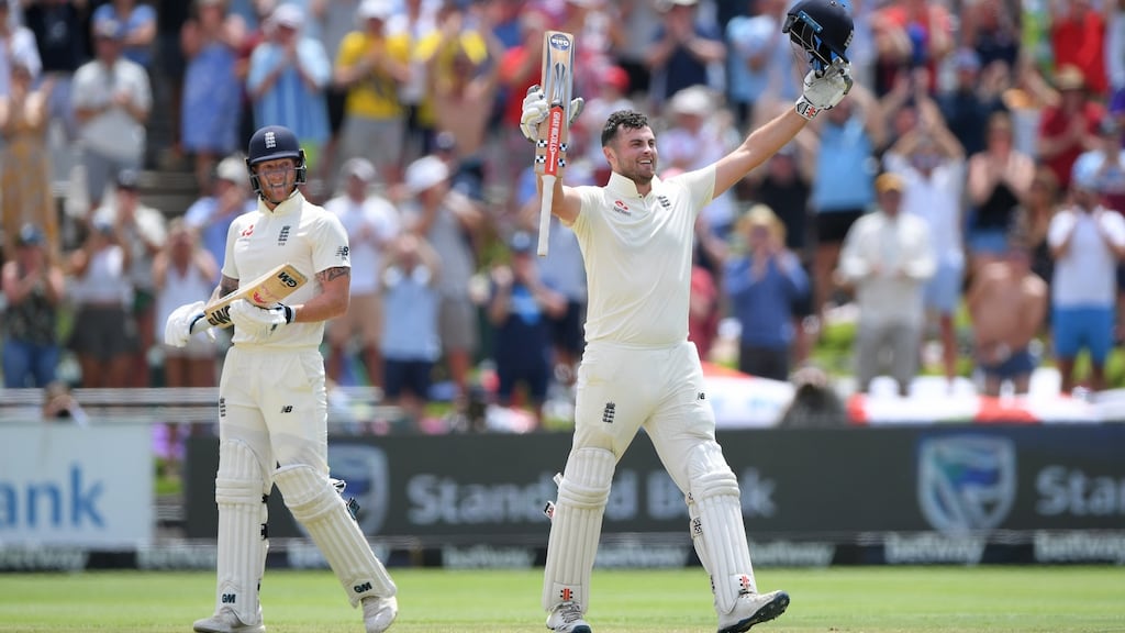 England batsman Dominic Sibley celebrates after reaching his maiden Test century s during day four of the second Test against South Africa at Newlands in Cape Town. Photograph: Stu Forster/Getty Images