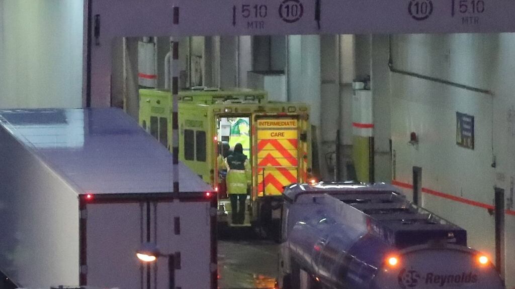 Emergency personnel at Rosslare Europort board a  ferry after 16 people were discovered in a sealed trailer on Thursday, November 21st: nine have gone missing. Photograph:  Niall Carson/PA