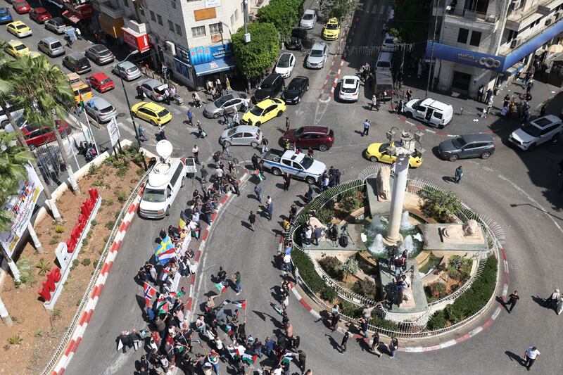 Palestinian demonstrators wave flags as they gather in the West Bank city of Ramallah to celebrate and support efforts of western countries that are recognizing a Palestinian state on September 23rd. Photograph: Alaa Badarneh/EPA