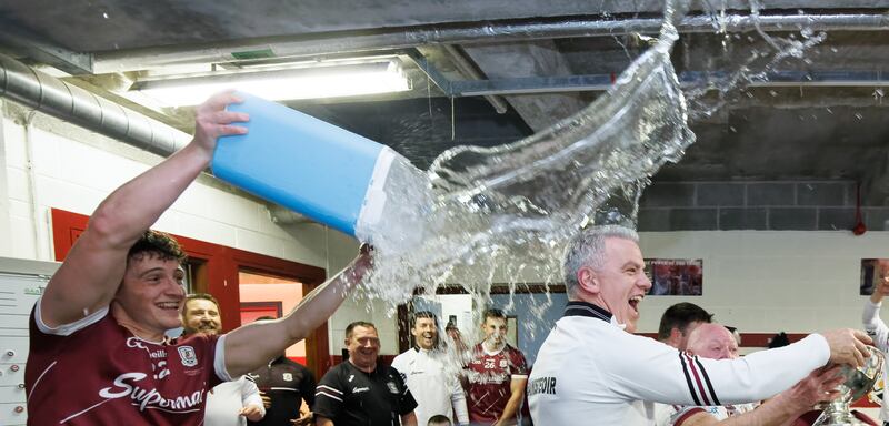 Galway’s Kieran Molloy throws water on manager Pádraic Joyce as they celebrate after the game. Photograph: James Crombie/Inpho