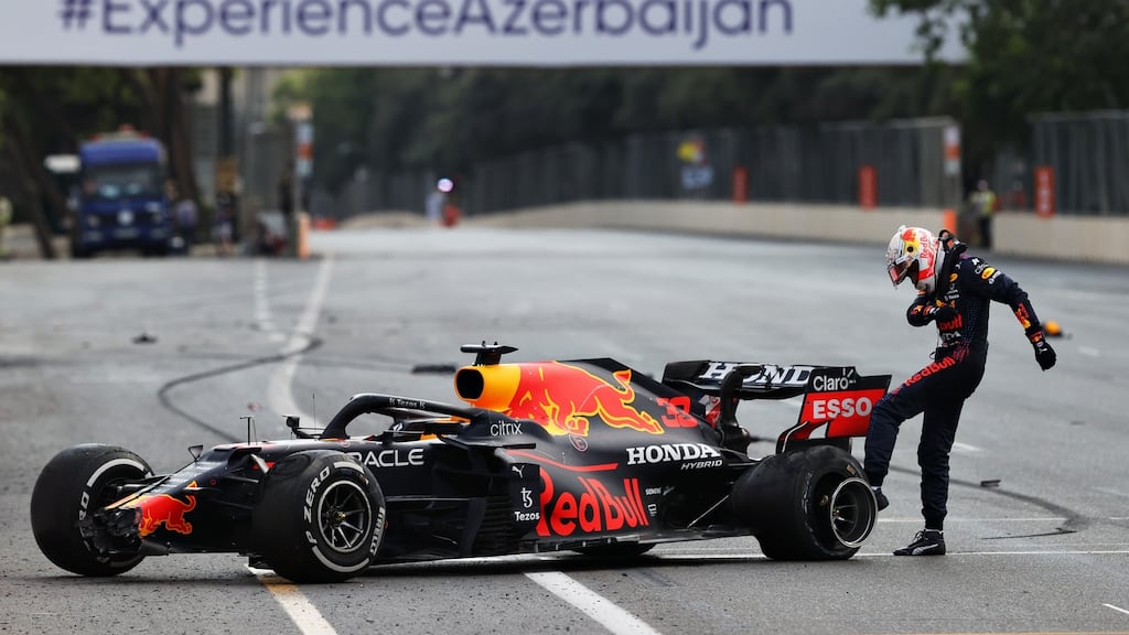 Dutch driver Max Verstappen kicks a tyre on his Red Bull  after crashing during the F1 Grand Prix of Azerbaijan at Baku City Circuit. Photograph:  Clive Rose/Getty Images