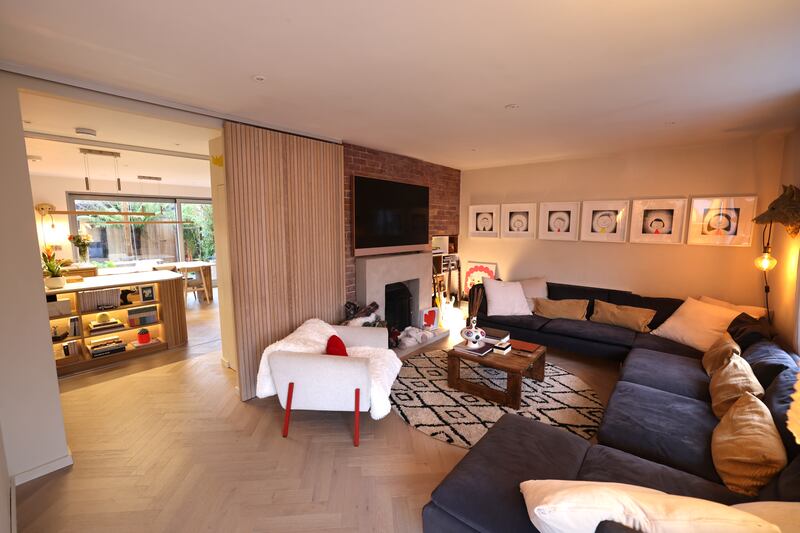 Tracy came up with the idea of a sliding wall between the kitchen and the rest of the house. Photograph: Dara Mac Dónaill