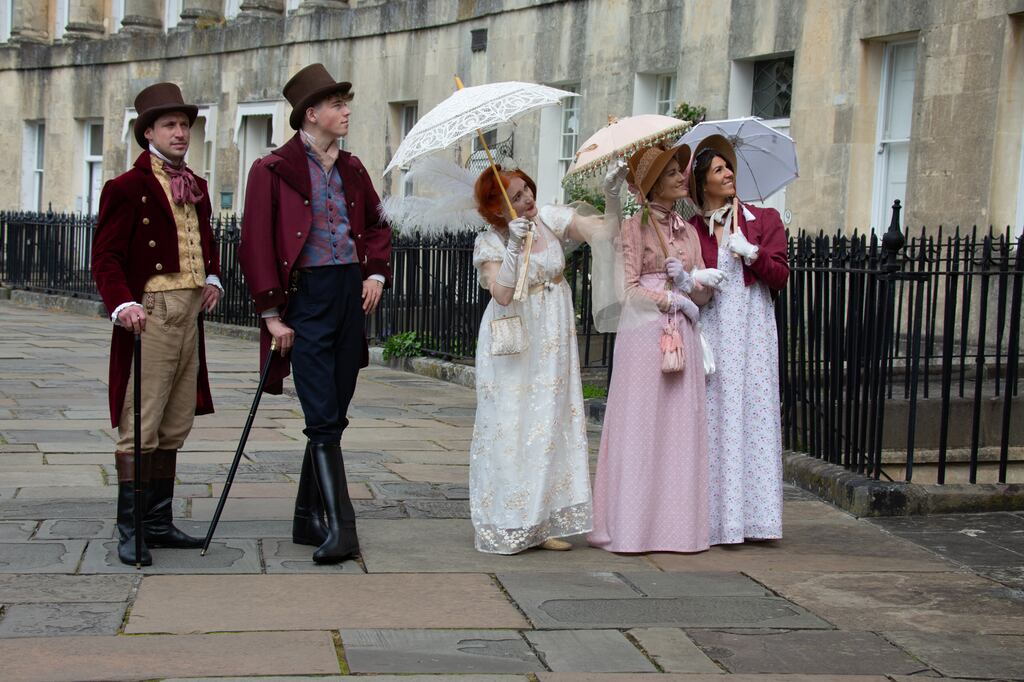 Strictly Jane Austen walking tour group navigating the cobbled streets of Bath