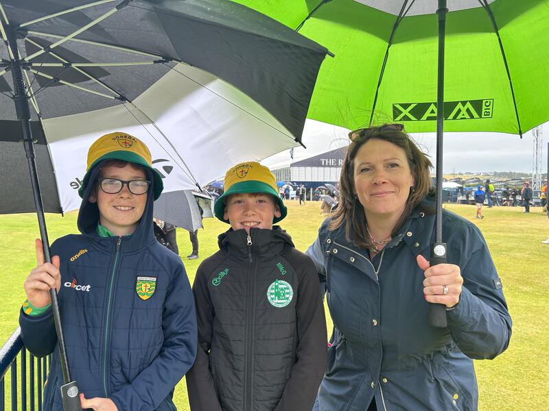 Ciarán McGuinness (13), from Ballyshannon, Co Donegal, with his brother Michael (11) and their mother, Gráinne