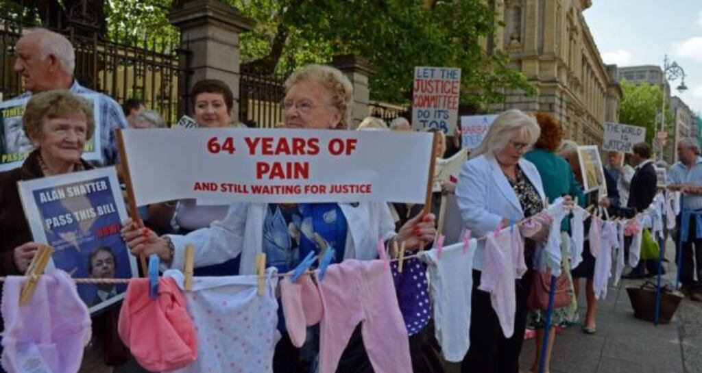 People taking part in a demonstration held by the group Survivors of Symphysiotomy outside Leinster House in June. Photograph: Eric Luke