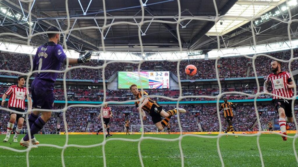 Hull City’s Stephen Quinn scores his teams fourth at Wembley Stadium. Photograph: Martin Rickett/PA Wire