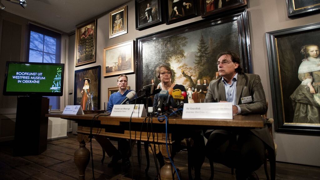 Dutch art historian and art detective Arthur Brand, Hoorn mayor Yvonne van Mastrigt and director of the Westfries Museum Ad Geerdink hold a press conference on stolen art works in Hoorn. Photographi Olaf Kraak/AFP/Getty Images