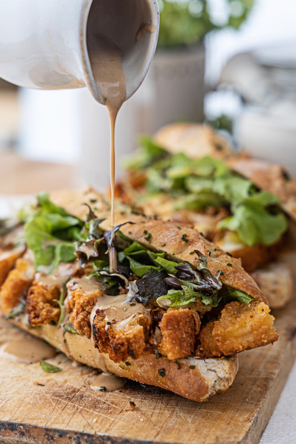 Air fryer chicken fillet roll with creamy pepper sauce on home made no-knead baguette. Photograph: Harry Weir Photography