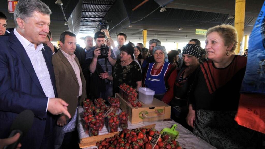 Ukrainian businessman, politician and presidential candidate Petro Poroshenko (left) meets supporters during his election campaign in Odessa on Wednesday. Photograph: Reuters/Mykola Lazarenko/Pool