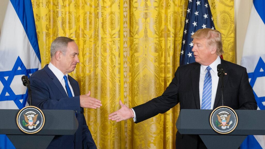 Israeli prime minister Binyamin Netanyahu with US president Donald Trump whose statement that he favoured neither the two-state solution nor the one-state solution has unsettled Palestinians, Israelis, and the international community. Photograph: Michael Reynolds/EPA