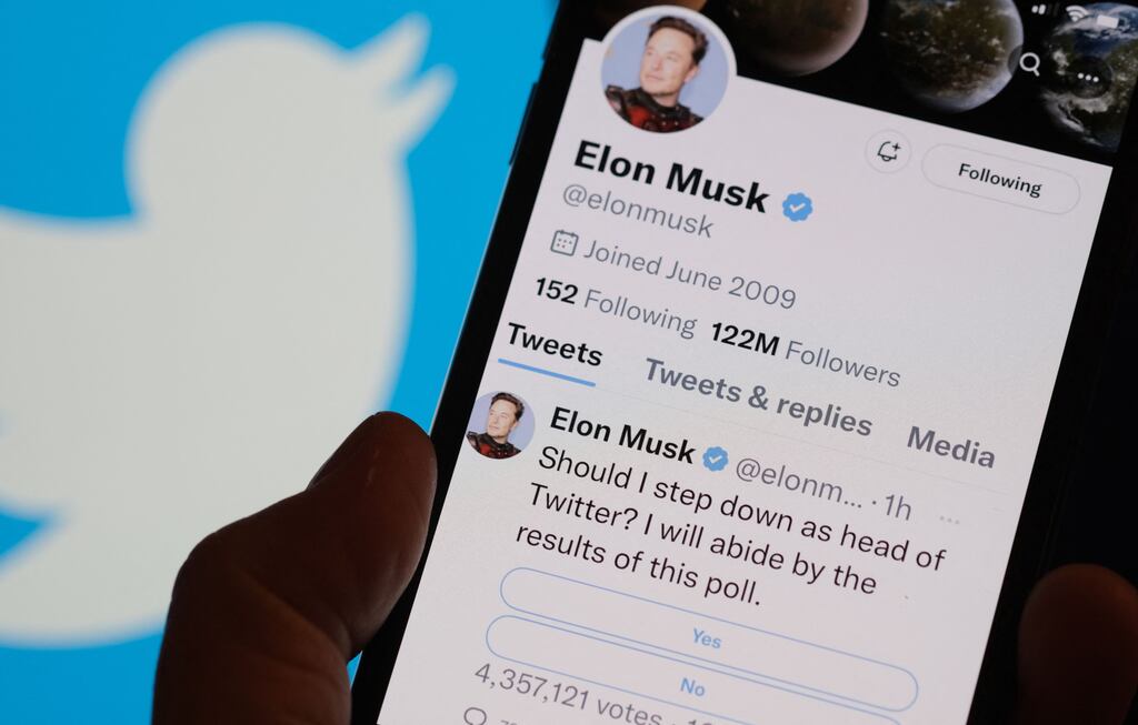 A mobile phone displaying Elon Musk's Twitter page last December where he was conducting a survey about his future as the head of the company. Photograph: Chris Delmas/AFP/Getty