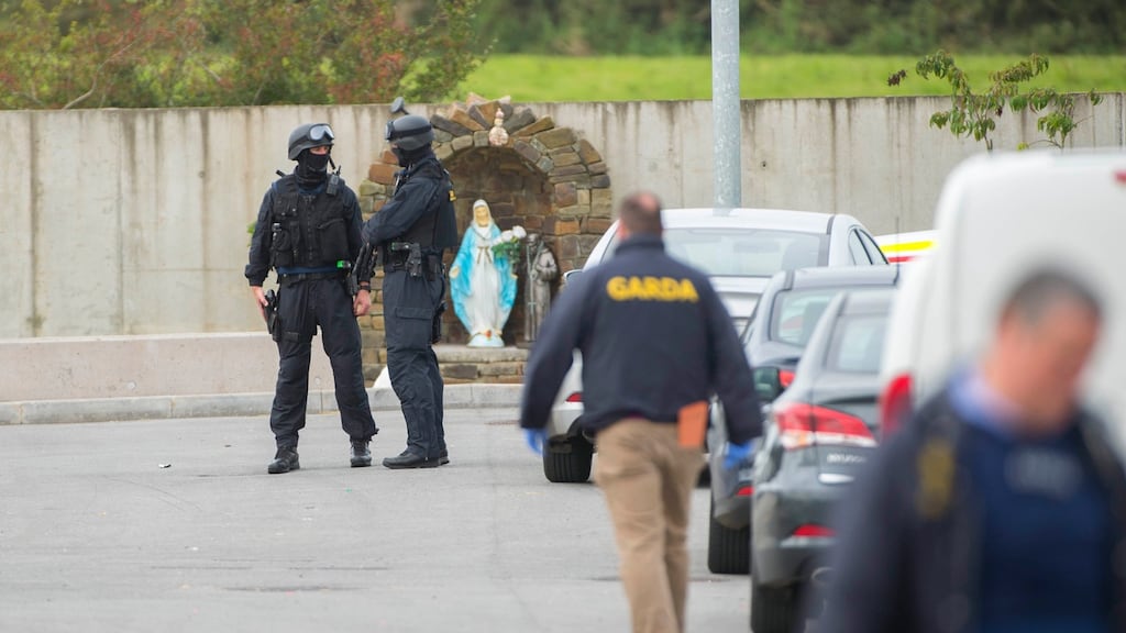 Gardaí at the scene of a search of a housing estate in Hollyhill, Cork City. Photograph: Michael Mac Sweeney/Provision