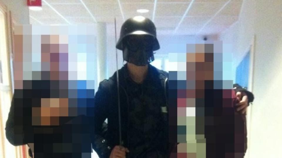Picture made available showing a masked man armed with a sword posing for a photo with two other students before attacking students and staff at the primary and middle school in Trollhattan, southwestern Sweden, on Thursday, killing two. Photograph: AFP