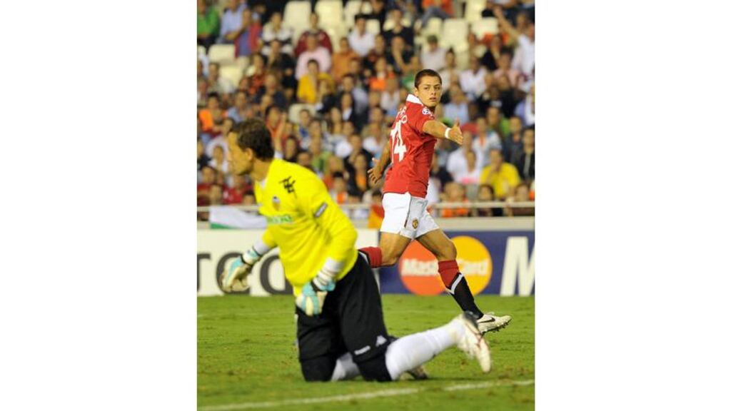 Javier Hernandez celebrates scoring the winner for Manchester United against Valencia. Photograph: Martin Rickett/PA Wire
