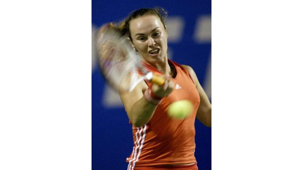 Martina Hingis, pictured playing an exhibition match in Brazil earlier this month, makes her return to competitive tennis in January?s Australian Hardcourt Championships.