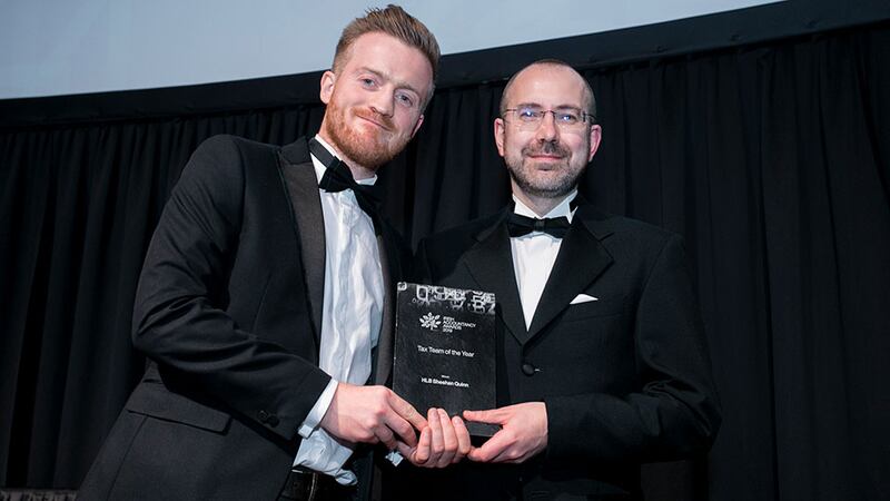 Fergal McManus, Regional Account Manager – Ireland, Confirmation, presents the Tax Team of the Year award to Bruce Stanley, HLB Sheehan Quinn.