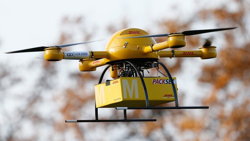 A quadcopter drone arrives with a small delivery at Deutsche Post headquarters in Bonn. The company is testing deliveries of medicine by drone over short distances. Photograph: Andreas Rentz/Getty Images