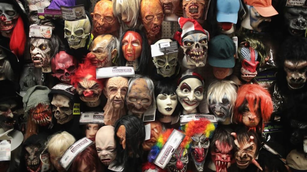 Bloody Halloween: Orange and black favours are hung in every supermarket. Disused shops become pop-up “Halloween stores”. Photograph: Scott Olson/Getty