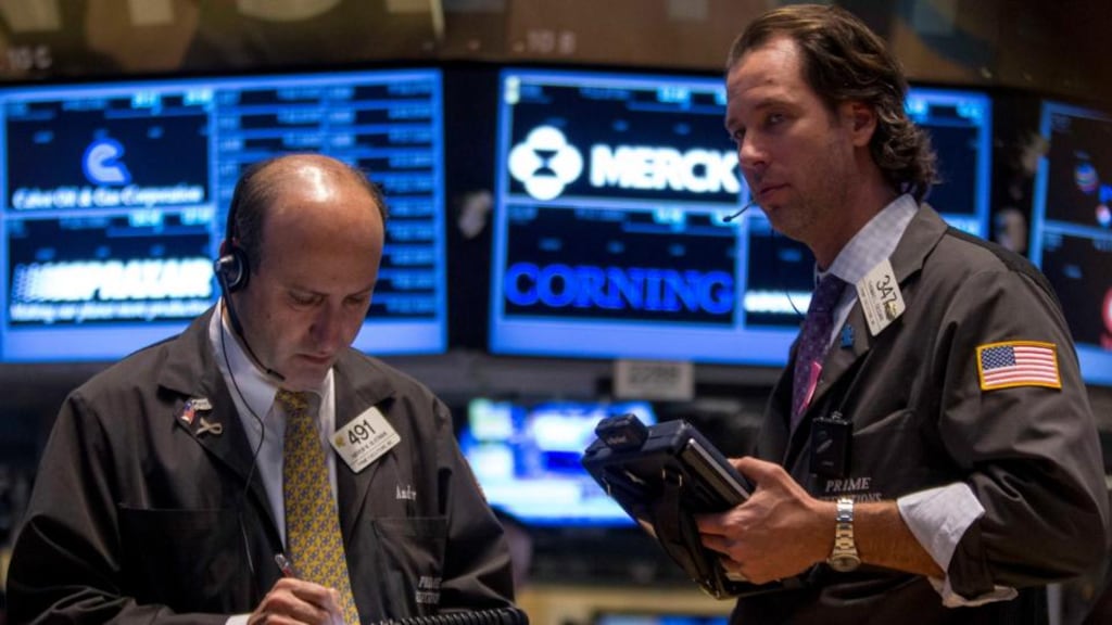 Traders work on the floor of the New York Stock Exchange. Photograph: Brendan McDermid/Reuters