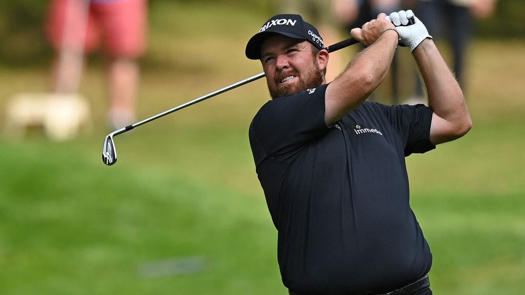 Ireland’s Shane Lowry watches his approach shot to the third green during the final round of the BMW PGA Championship at Wentworth. Photo: Glyn Kirk/AFP via Getty Images