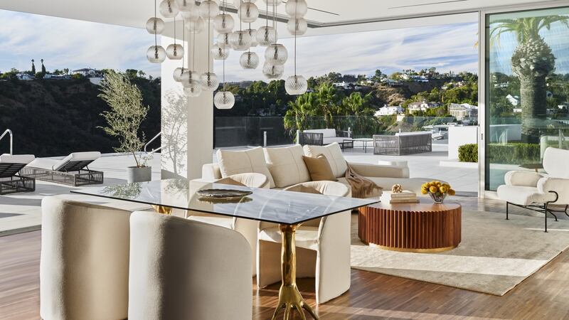 ‘The One’ is surrounded by a moat and has and has a 10,000 sq ft deck with views of the Pacific Ocean, the San Gabriel Mountains and downtown Los Angeles.