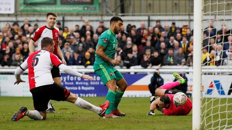 Troy Deeney scores Watford’s second at Woking. Photograph: David Klein/Reuters