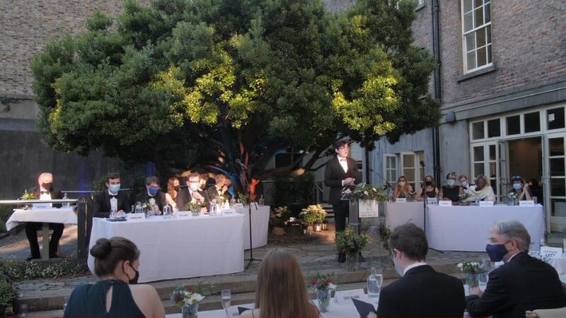 The 61st Irish Times Debate Final begins this evening, with the judges in the foreground, including Editor of The Irish Times Paul O’Neill at right. Screengrab: Youtube