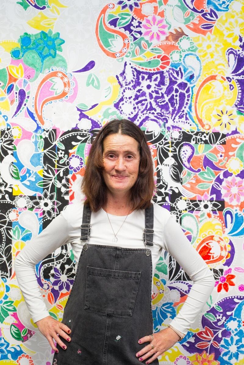 Claire O'Connor with her painting.