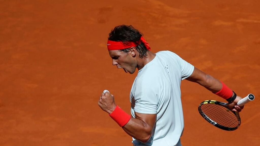 Rafael Nadal of Spain celebrates winning a point against Mikhail Youzhny of Russia during their men’s singles match at the Madrid Open tennis tournament. Photograph: Susana Vera/Reuters