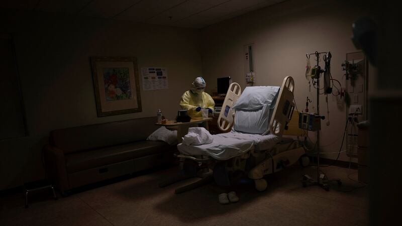 A nurse prepares to release a mother who had given birth after testing positive for the coronavirus, at a DHR Health hospital in Edinburg, Texas. Photograph: Lynsey Addario/New York Times