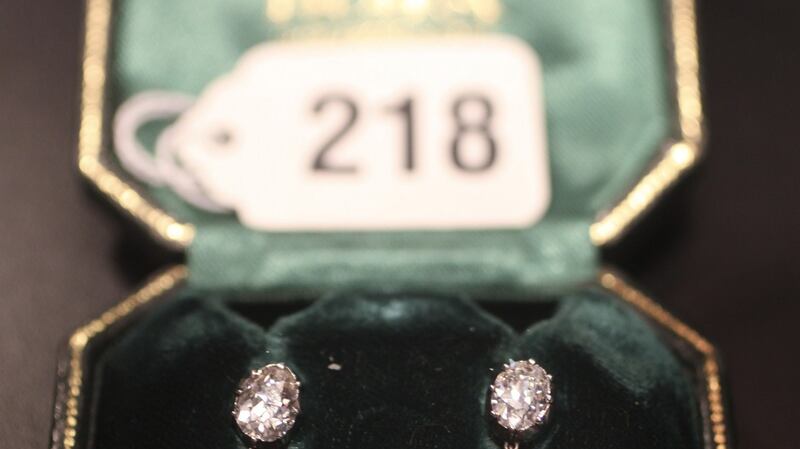 Diamond earrings from Ruth and Bernard Madoff are displayed during a media preview of their personal belongings in 2009. Photograph: Bloomberg