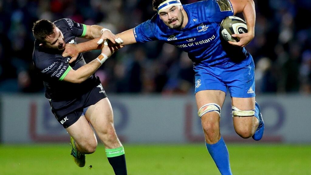 Leinster’s Max Deegan holds off Connacht’s Caolin Blade. Deegan’s execellent form is rewarded with the number eight jersey. Photograph: James Crombie/Inpho