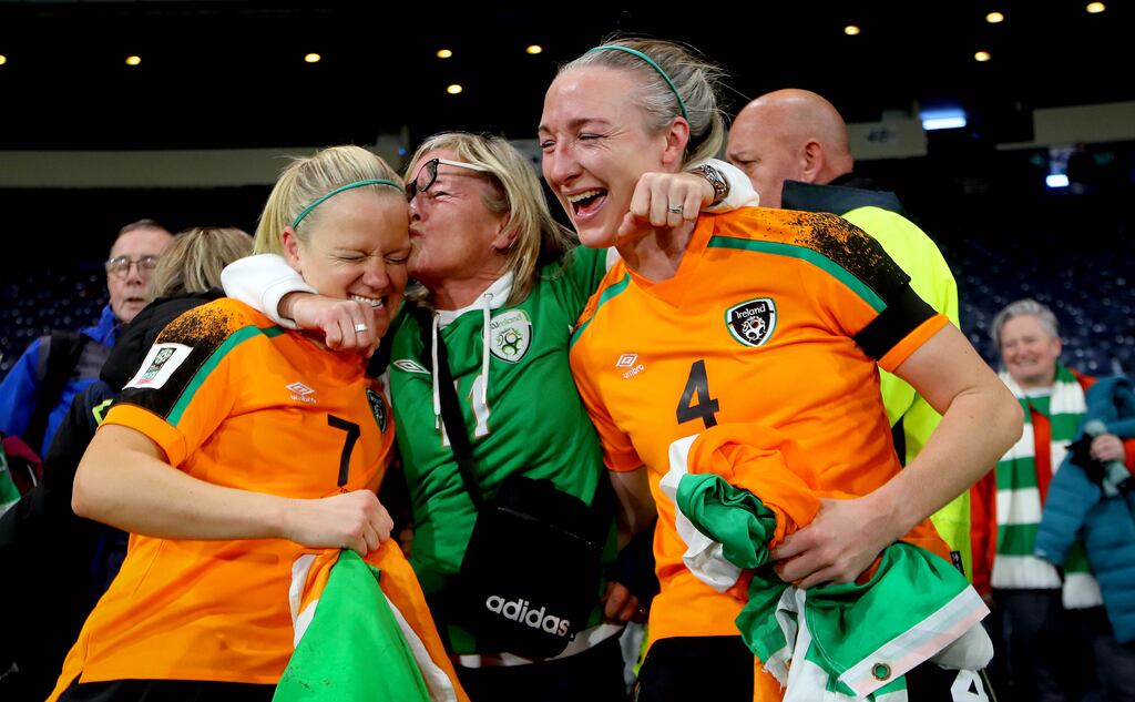Diane Caldwell and Louise Quinn celebrate with former Ireland international Olivia O’Toole after they clinched qualification for the World Cup. Now, where do I get my jersey? Photograph: Ryan Byrne/Inpho