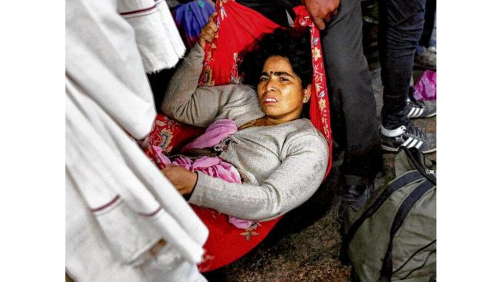 An injured woman who survived the stampede