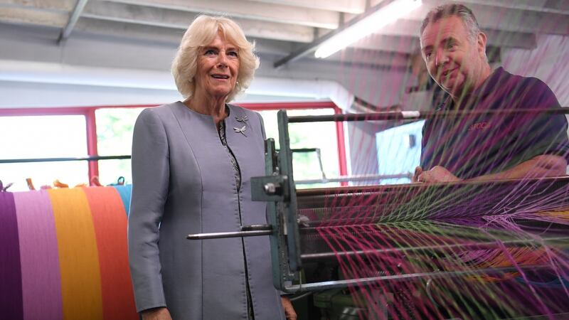 Camilla, Duchess of Cornwall is shown a loom as she visits the Avoca Mill in Co Wicklow. Photograph: Neil Hall/Pool/Getty Images