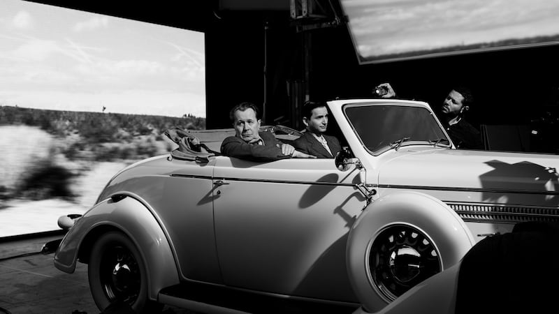 Gary Oldman as Herman Mankiewicz and Sean Persaud as Tommy in David Fincher’s Mank. A scathing social critique of 1930s Hollywood seen through the eyes of alcoholic screenwriter Herman J Mankiewicz as he races to finish the screenplay of Citizen Kane for Orson Welles. Photograph: Gisele Schmidt/ Netflix