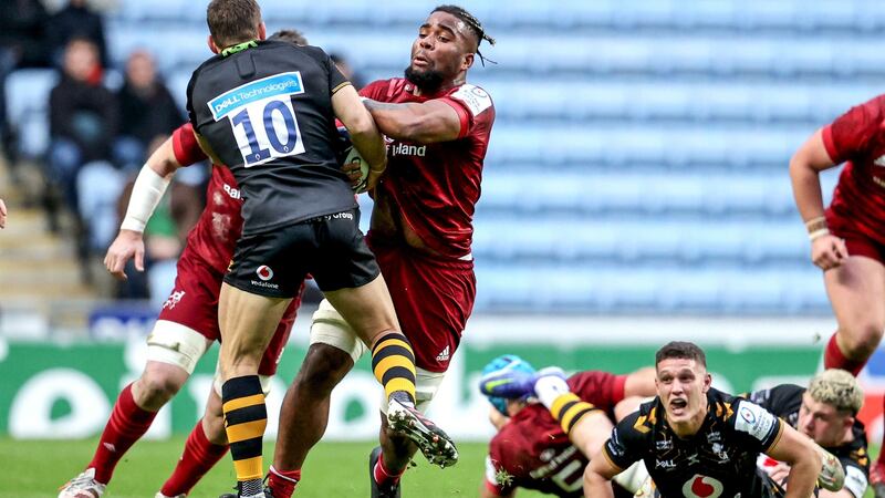 Daniel Okeke barrels through Jimmy Gopperth. Photograph: Dan Sheridan/Inpho
