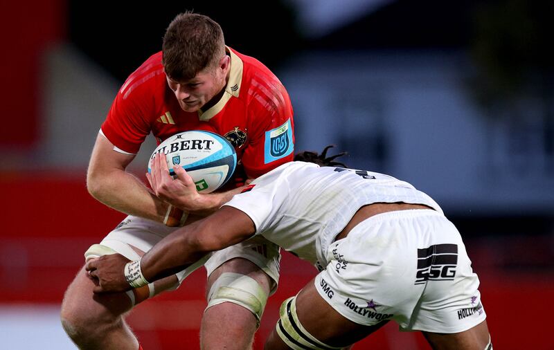 Munster’s Jack O’Donoghue and Vincent Tshituka of Sharks. Photograph: Ryan Byrne/Inpho