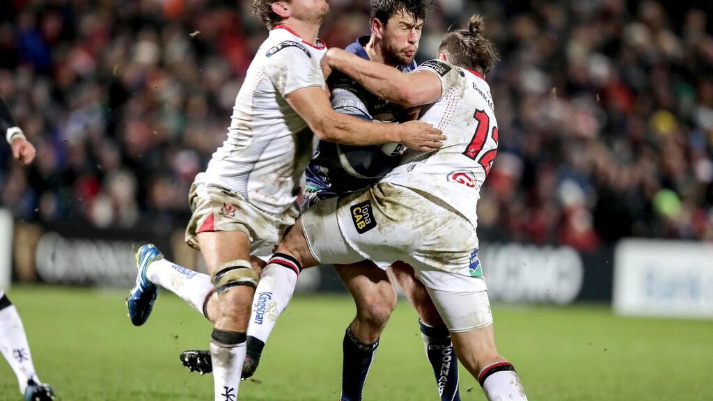 Ulster’s Chris Henry and Stuart McCloskey with Danie Poolman of Connacht during their Pro12 clash at Ravenhill. Photo: Inpho