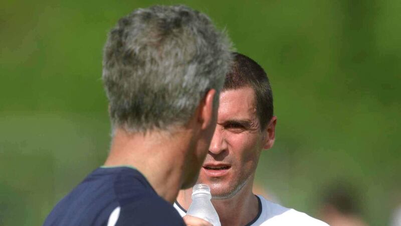 Roy Keane chats to Mick McCarthy during squad training at the Adagym sportsgrounds in Saipan on May 20th, 2002. Photograph: David Maher/Sportsfile