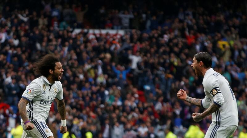 Real Madrid’s Marcelo celebrates scoring with team-mate Sergio Ramos in the La Liga game against Valencia at the Santiago Bernabeu Stadium. Photograph: Susana Vera/Reuters