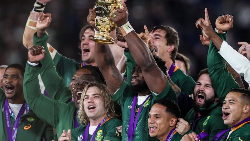 Siya Kolisi lifts the Webb Ellis Cup. Photograph: Billy Stickland/Inpho