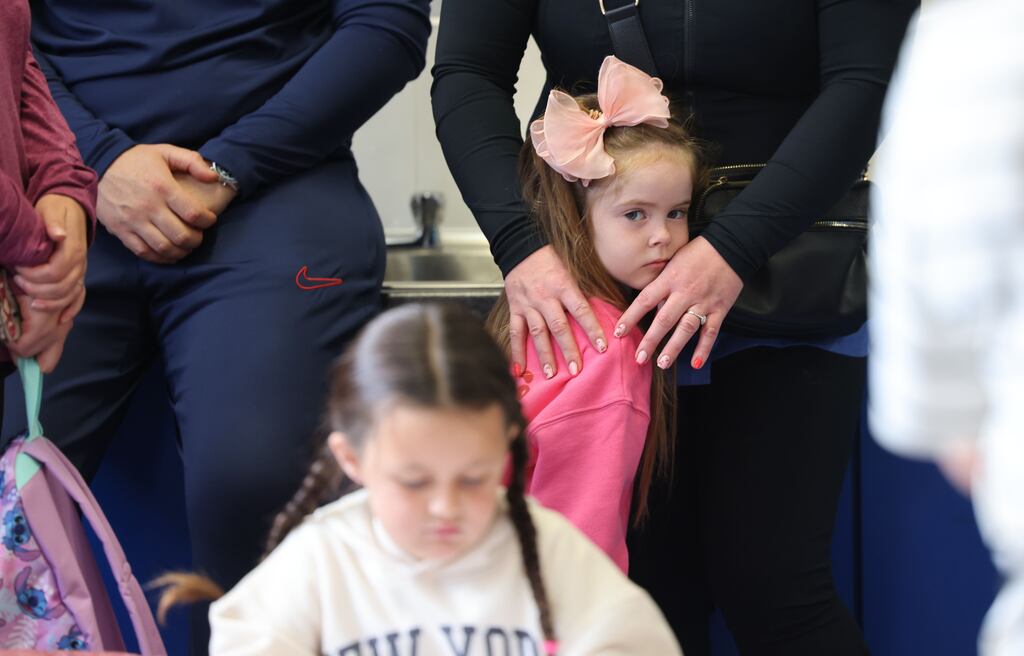 Children attending their first day at school at Broombridge ETNS in Cabra, Dublin. Photograph: Dara Mac Dónaill