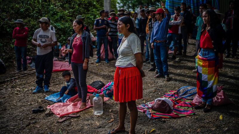 Blocking the road from Cochabamba to Santa Cruz in Bolivia. Thousands of people have camped on strategic roadways in Bolivia demanding the return of former president Evo Morales. Photograph: Federico Rios/The New York Times